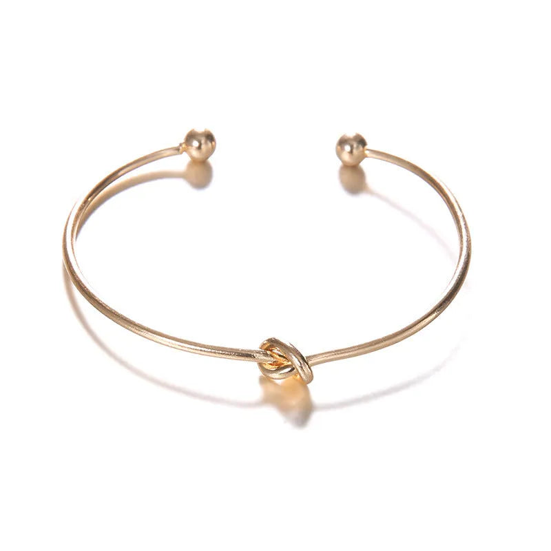 Women's gold-tone vintage arrow knot cuff bracelet with European-American jewellery style