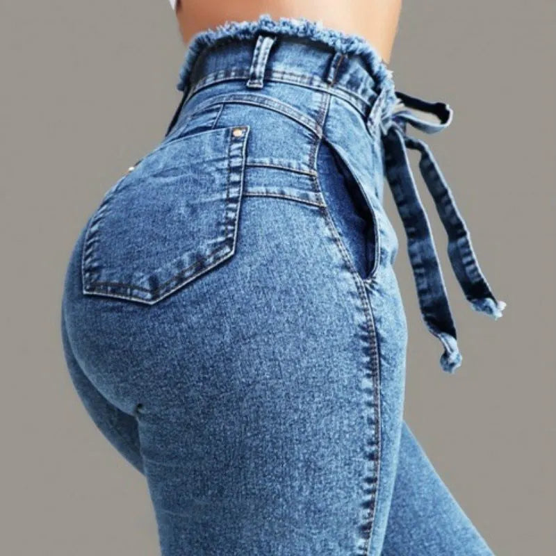 Grey fringed straight-leg jeans made from Cowboy fabric on a size chart showing S to 5XL.