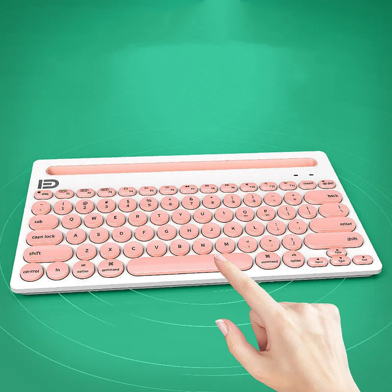 Wireless Bluetooth keyboard in black and pink colours, ultra-slim 22mm profile, compact 297x178mm size for home and office use