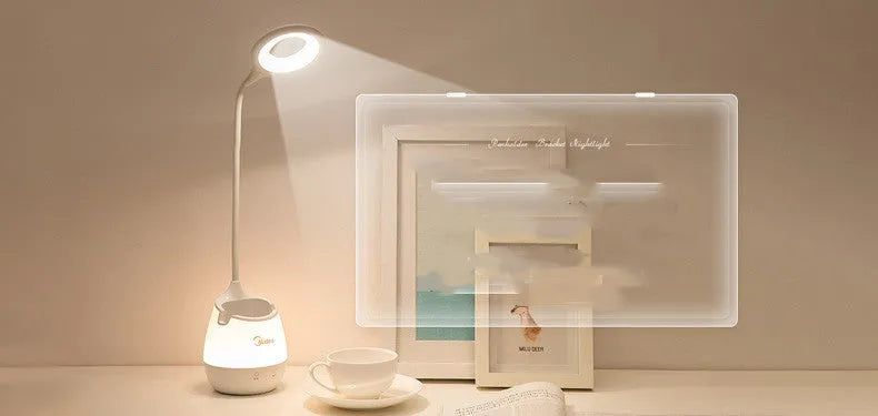 Green USB rechargeable touch table lamp on a wooden surface.