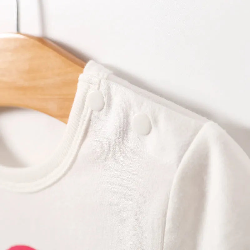 Short sleeve triangle romper in cotton with Love Mum and Love Dad prints, available in 59cm to 80cm suitable heights.