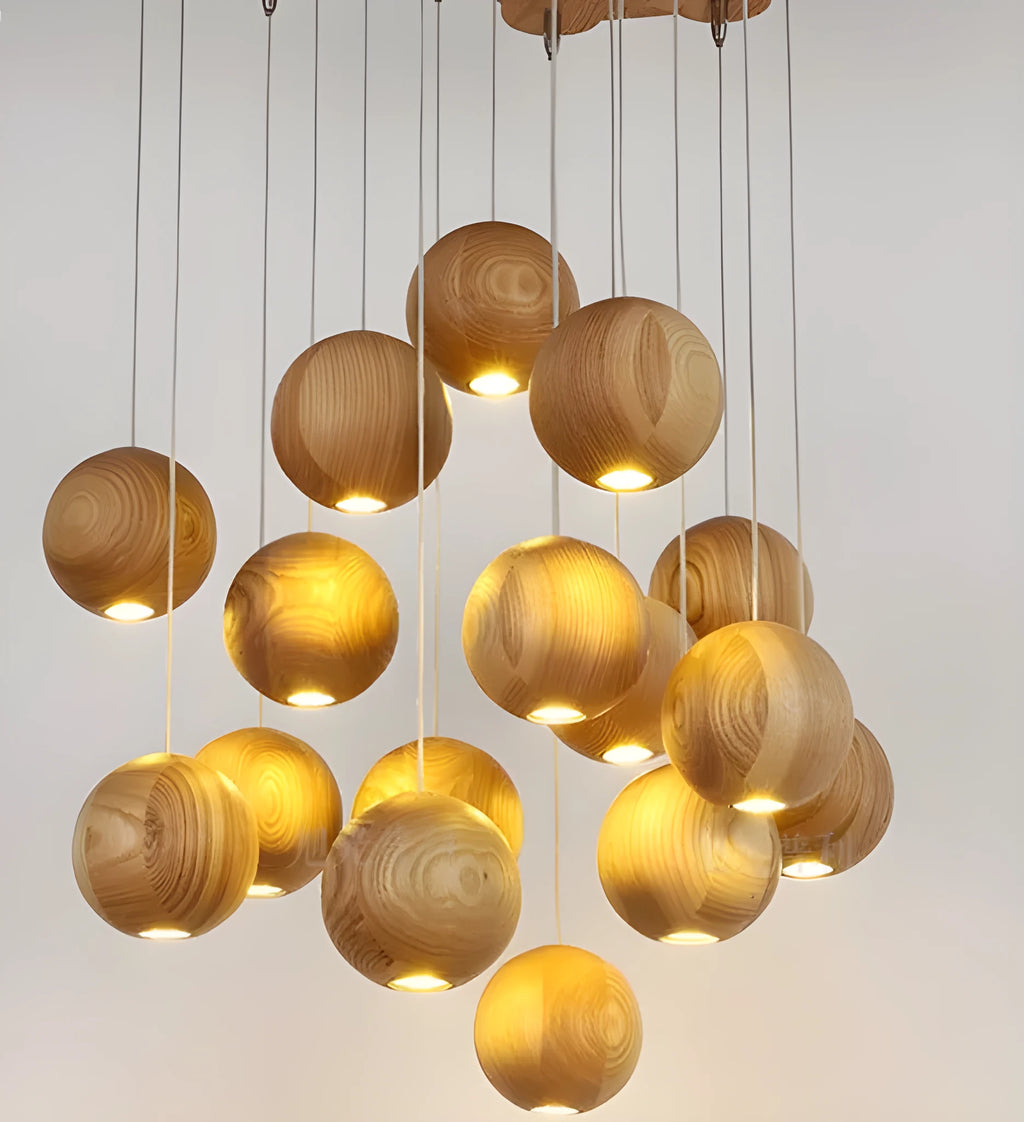 Nordic solid wood ball pendant chandelier with an adjustable cord hanging from a wooden disc.