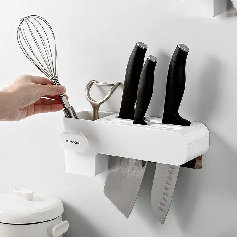 Modern white plastic kitchen knife storage rack with seven slots for organising cutlery