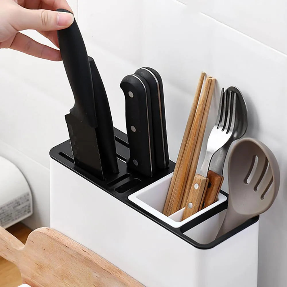 White plastic kitchen knife storage rack with integrated shelf and partitioned compartments