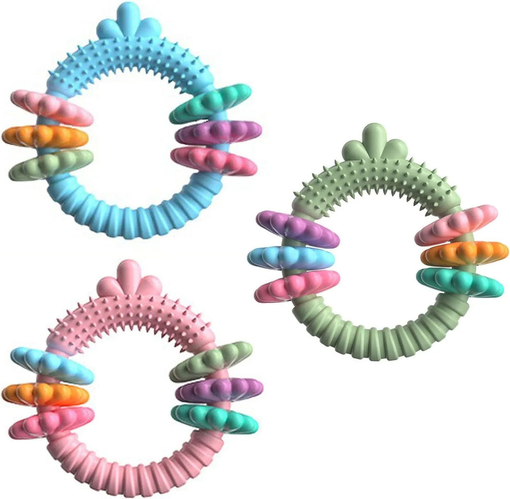 Blue TPR rubber ring dog chew toy with squeaker for small dogs on a white background.