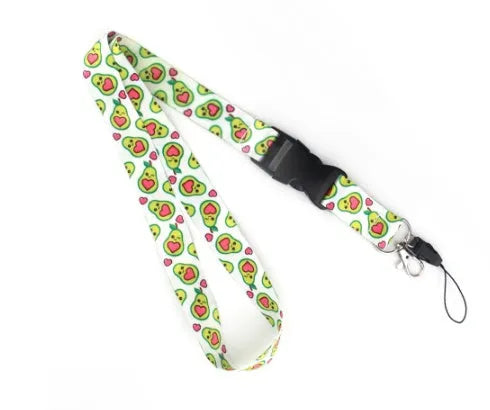 Avocado cartoon design on a green and black double-sided polyester phone lanyard with a silver adjustable buckle.