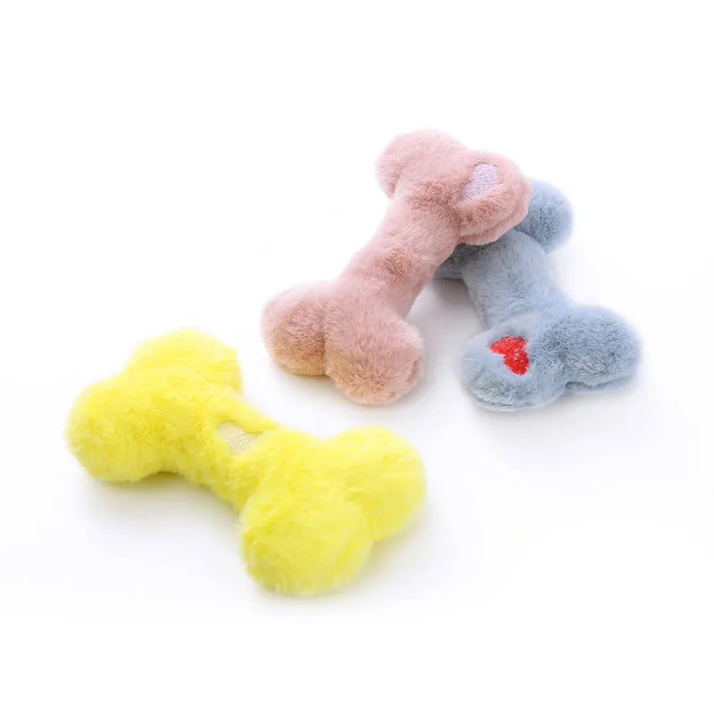 Blue heart-shaped love bone plush dog toy with a squeaker for interactive pet play.