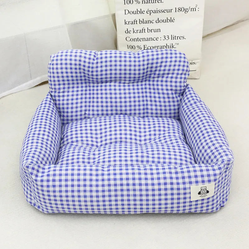 Grey and blue plaid cloth car pet bed for dogs shown in small and large size options.