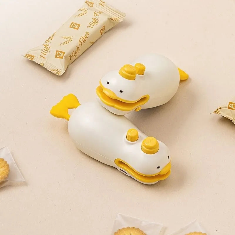 Yellow duck-shaped rechargeable bag sealing machine with animal jacquard pattern and charging cable