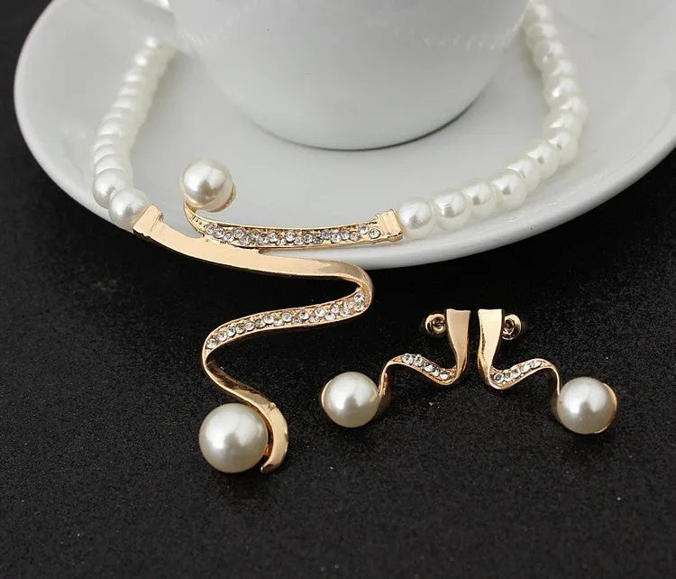 Gold electroplated pearl necklace and earrings set with deep V clavicle design