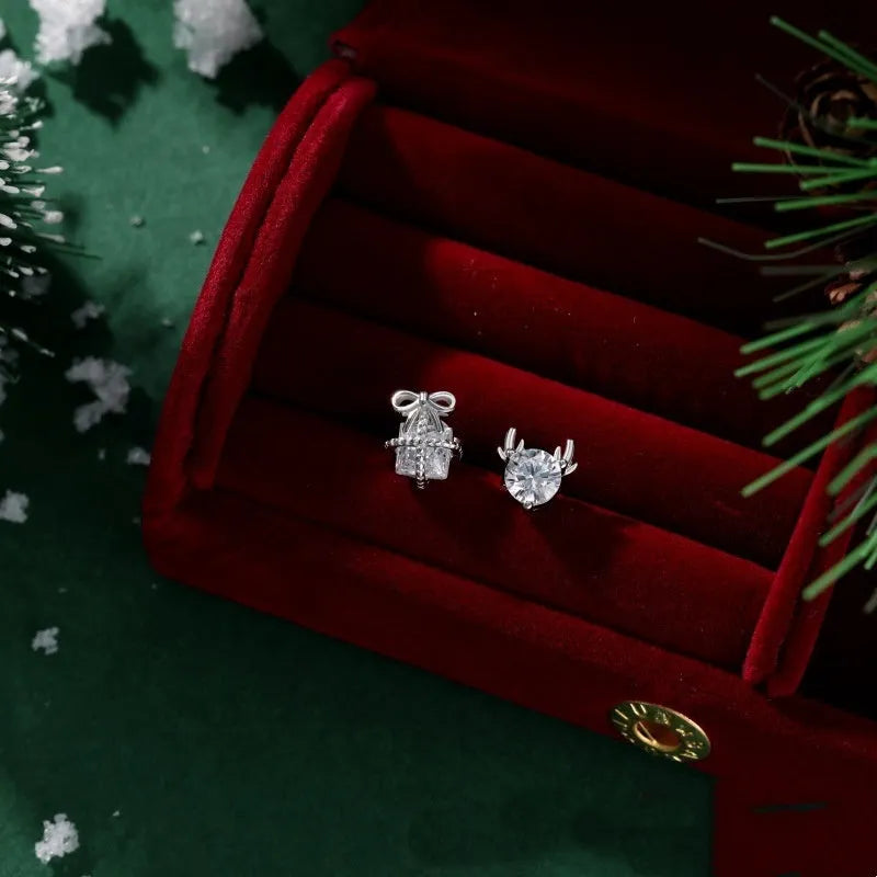 Pair of 925 sterling silver irregular bow and deer earrings with zircon inlay