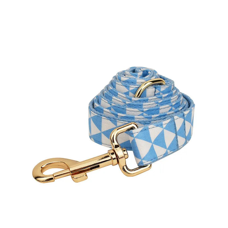 Blue cloth dog collar, leash, decorative bow, and vest set for small to medium dogs
