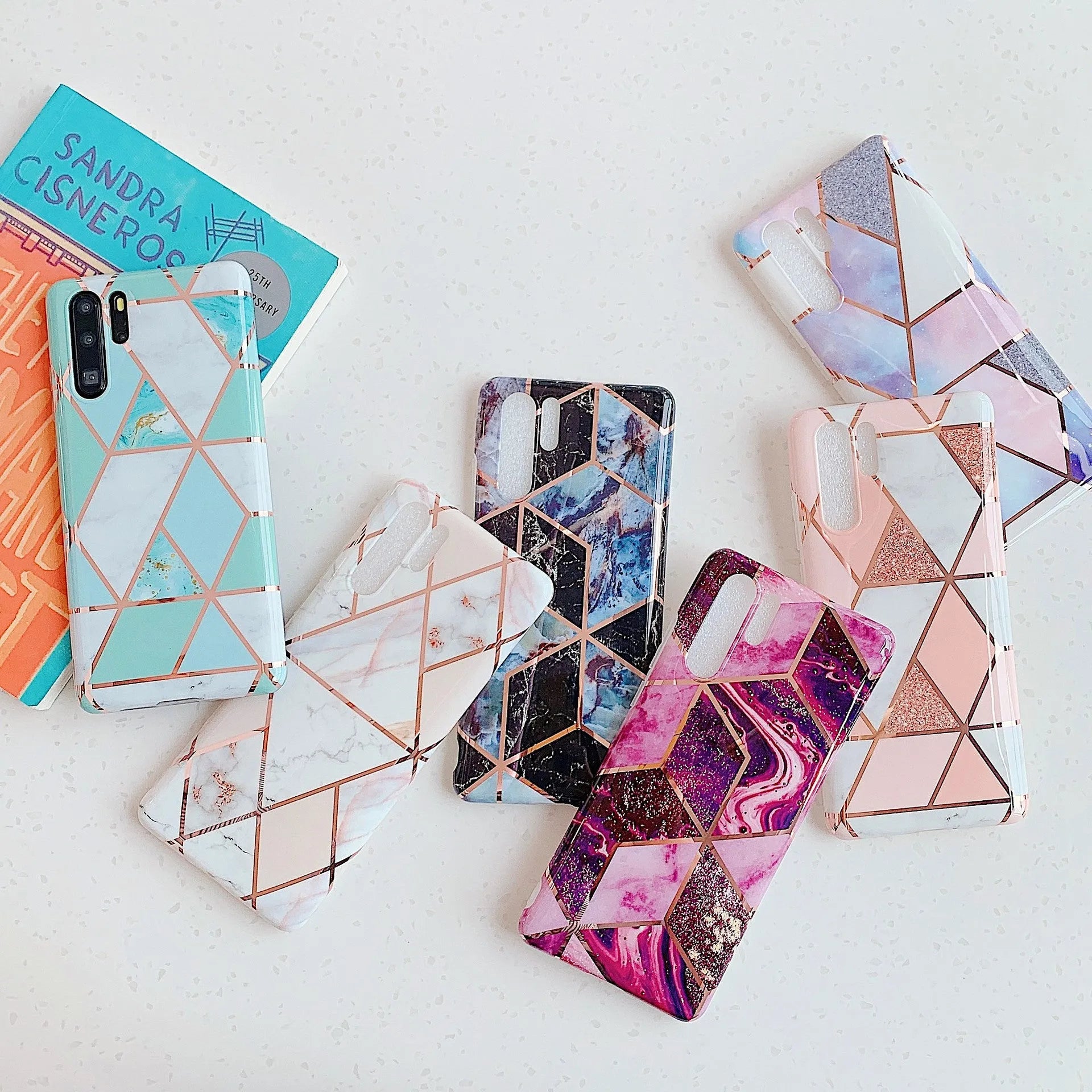 Electroplated marble finish TPU mobile phone case for Huawei and Samsung smartphones in various colours.