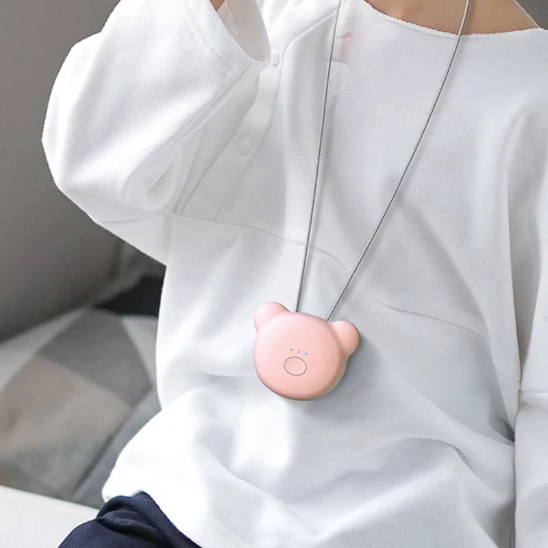 USB mini portable air purifier necklace in blue, grey, pink or white colours with charging cable