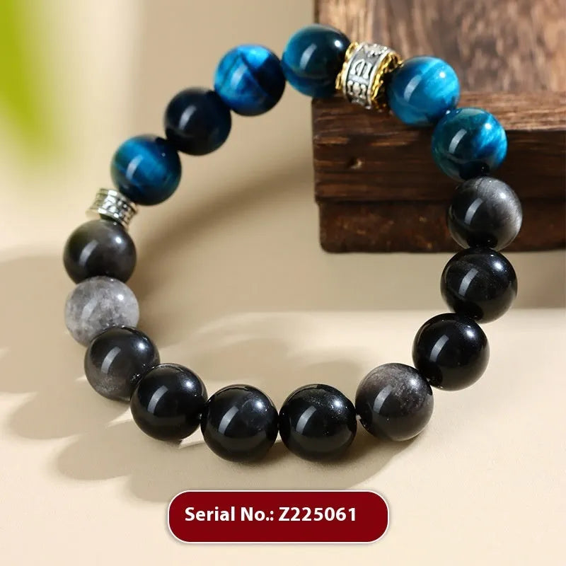 Peacock blue Tigereye stone bracelet with geometric ethnic design on wrist