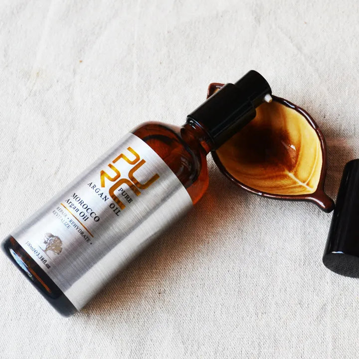 PURC Natural Moroccan Nut Hair Oil 100mL bottle for dry, dyed and damaged hair with gloss finish