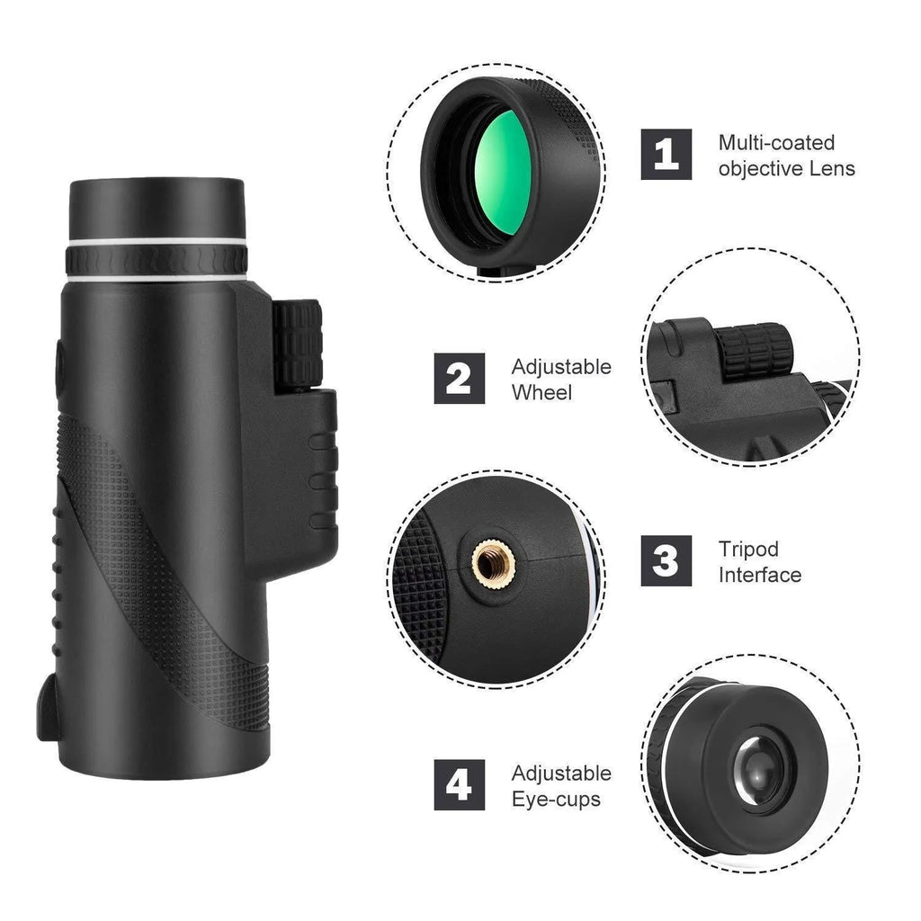 Black 40x60 monocular telescope with mobile phone attachment for photography on a table.