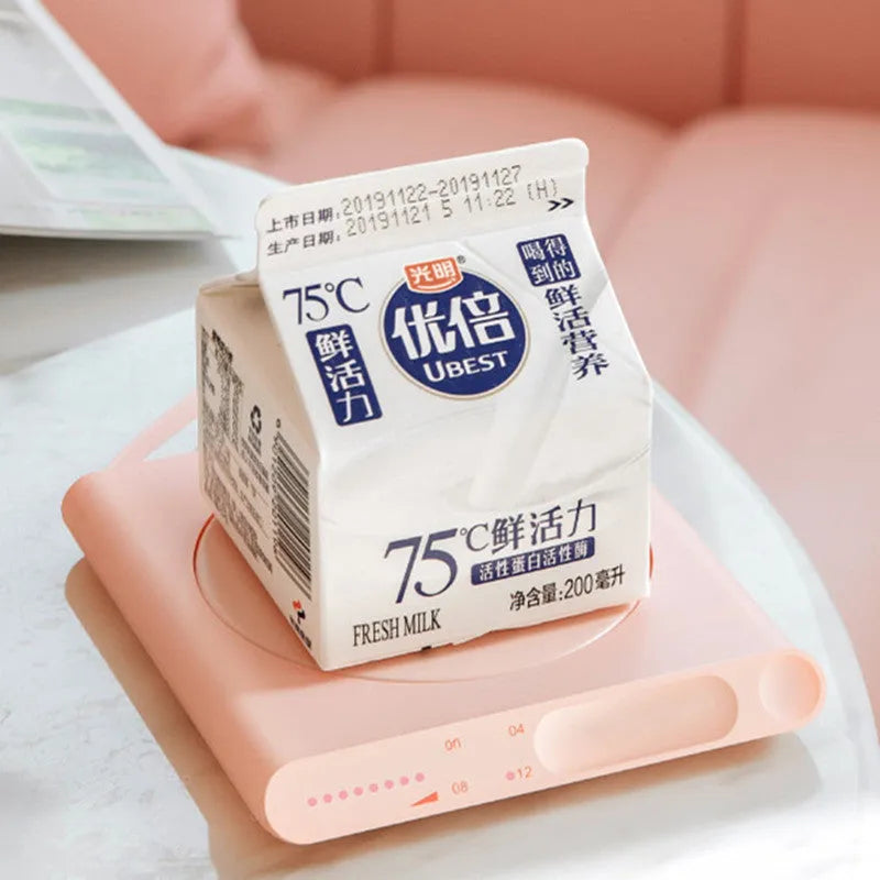USB heating cup pad coaster in pink or white with mechanical controls