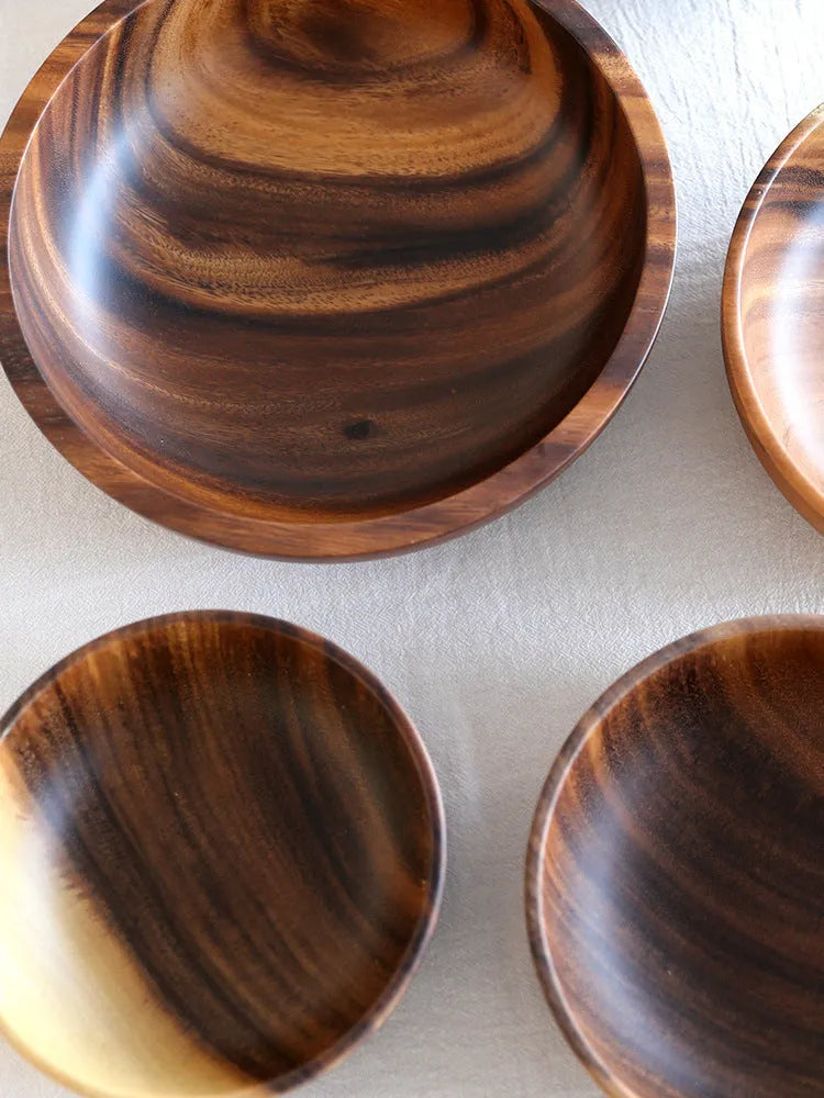 Brown wooden bowl set with natural grain, Japanese design, multiple sizes for kitchen serving