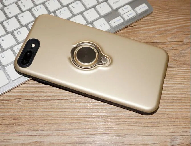 Slim black magnetic back cover case for iPhone on a magnetic car vent mount.