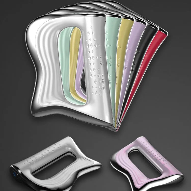 Rectangular natural resin muscle massager and scraping board on a flat surface.