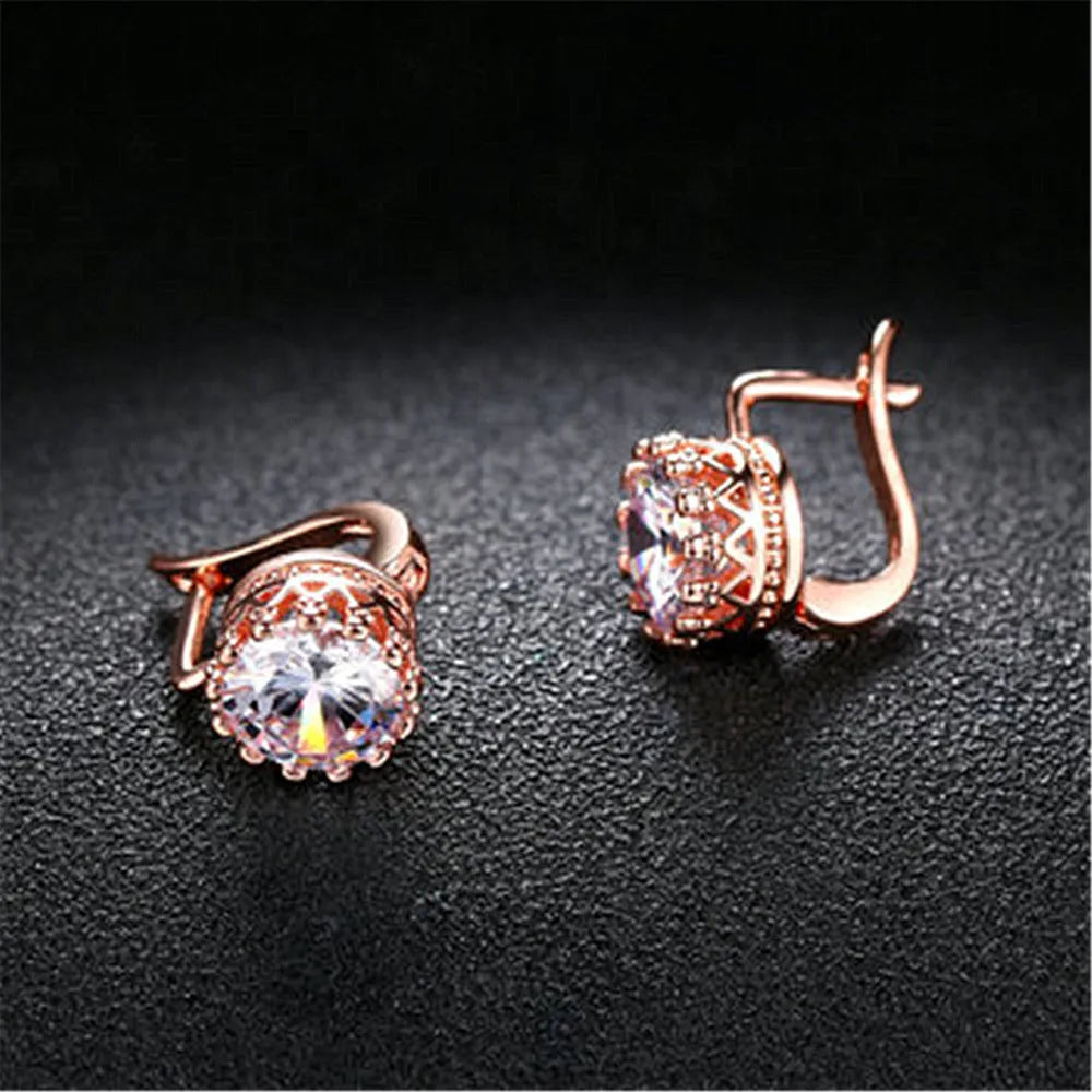 Korean retro crown ear clip in rose gold and white gold colour options on a white background.