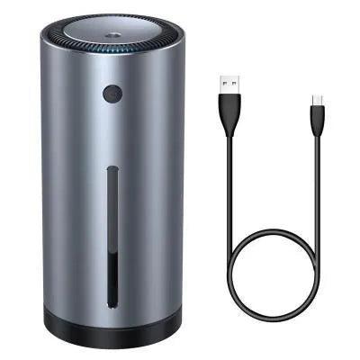 Black aluminium alloy car humidifier and air purifier with USB cable on a desk