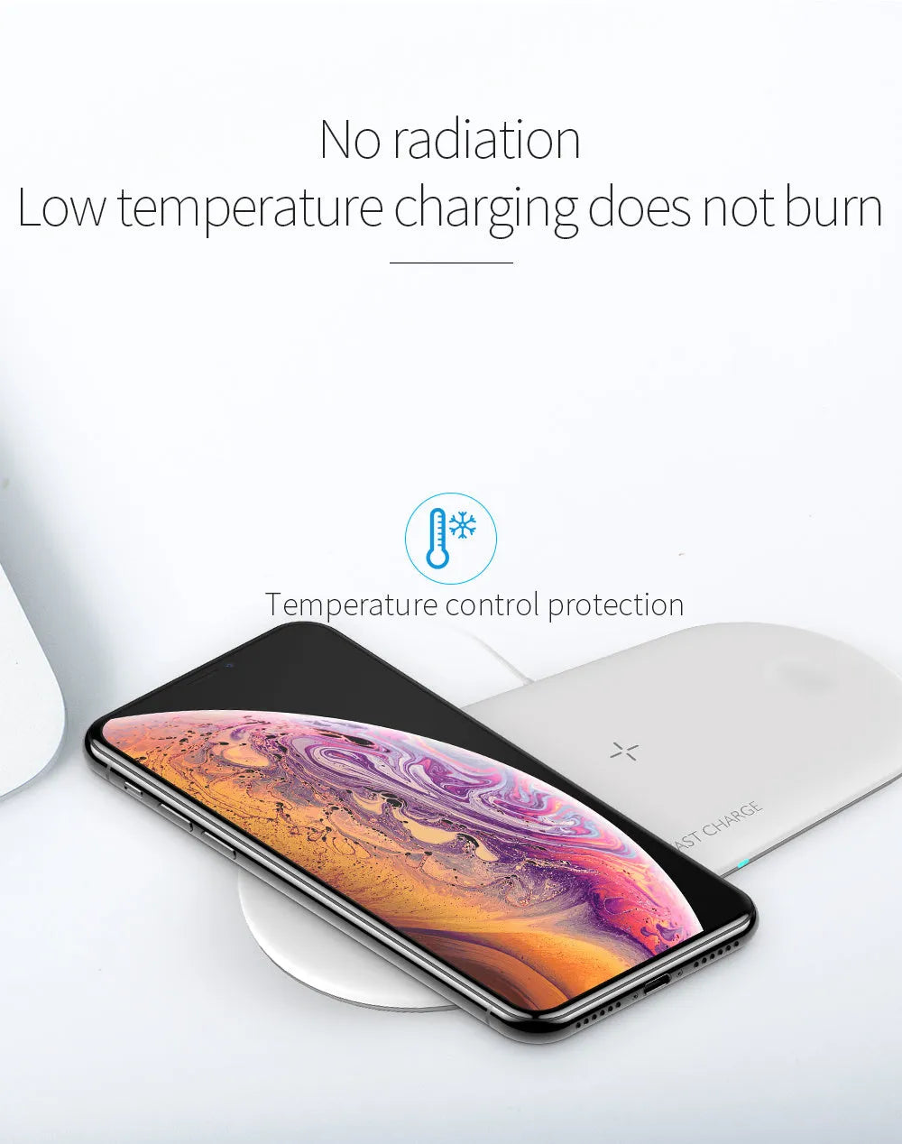 Black three-in-one wireless charging station for Apple Watch, mobile phone and earbuds on a desk