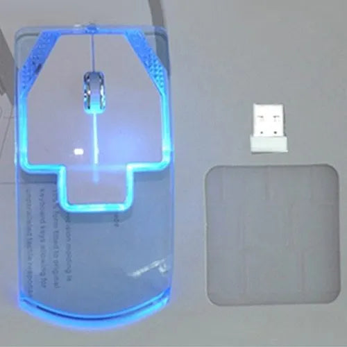 Ultra-thin transparent 2.4GHz wireless optical luminous mouse with blue glow on white desk
