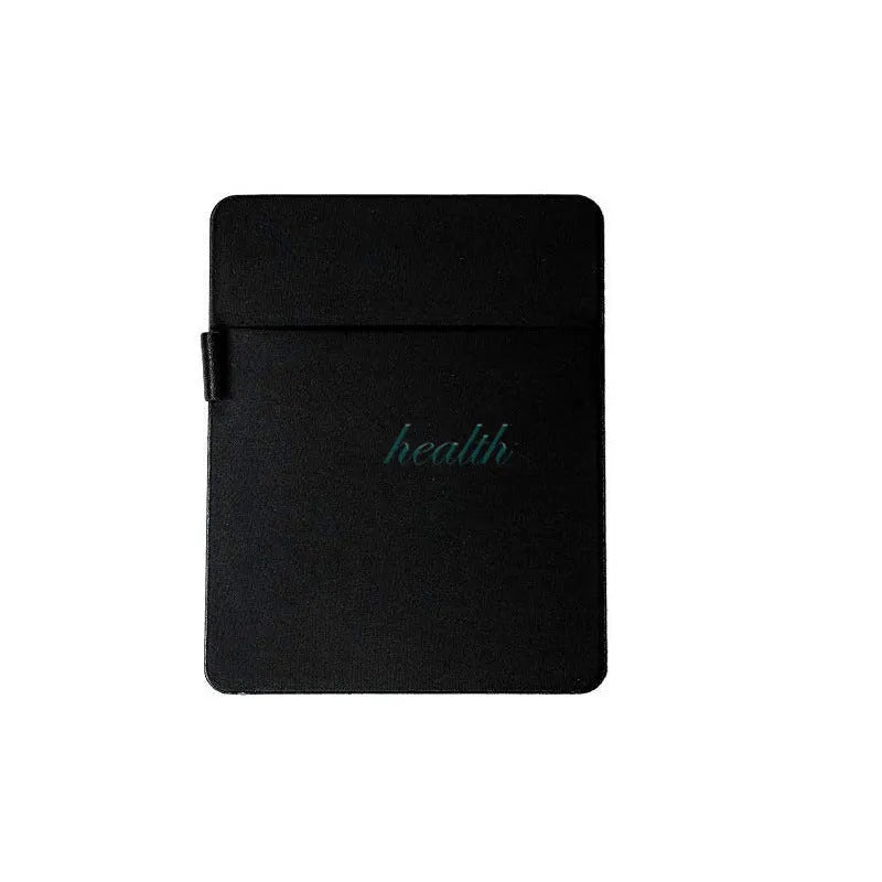 Black adhesive Lycra laptop back storage bag 15x12cm with pen loop, attached to laptop showing items inside