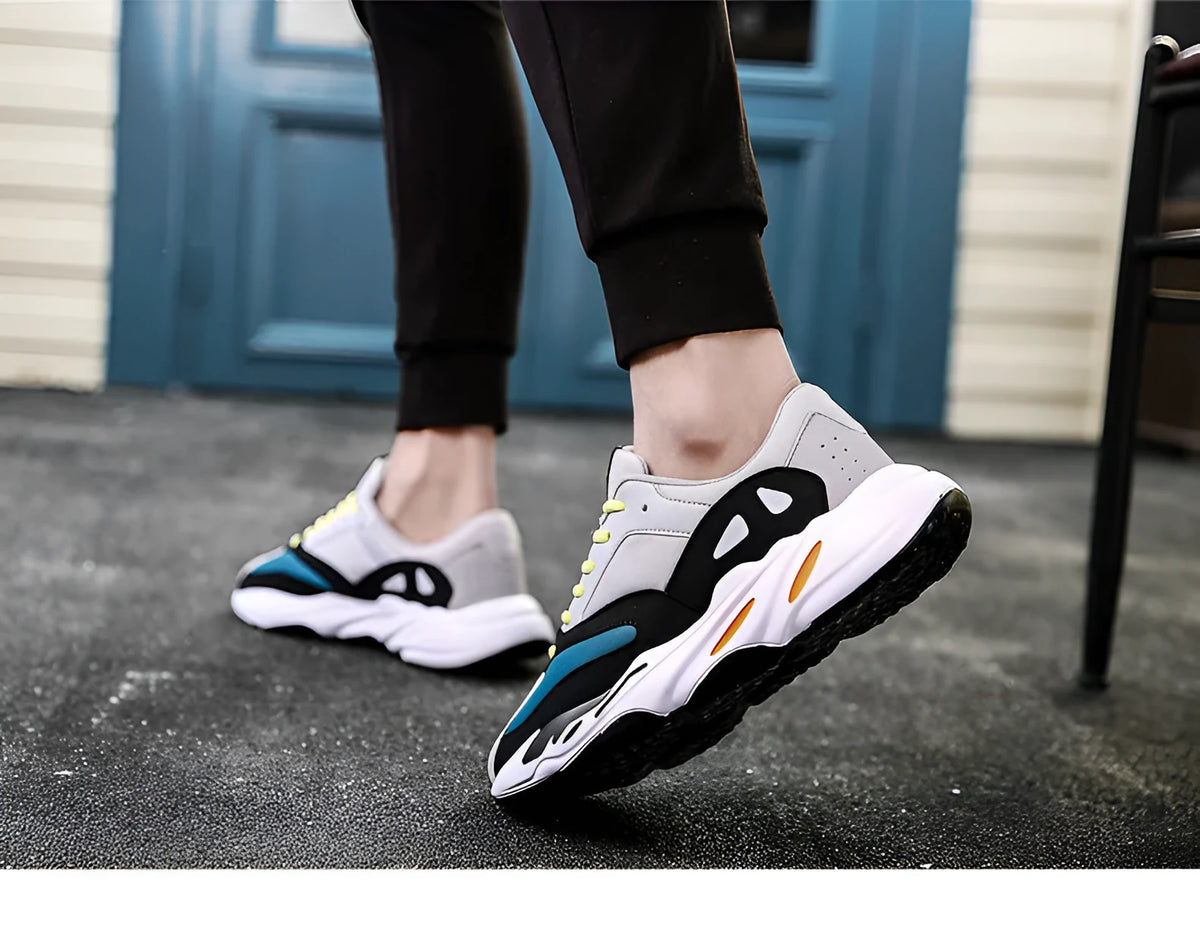 Peliam sneakers in black and grey, lace-up style, available in sizes 39-44