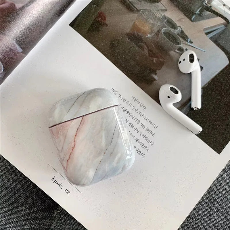 White marble patterned hard PC protective cover for AirPods 1 and AirPods 2 charging case.