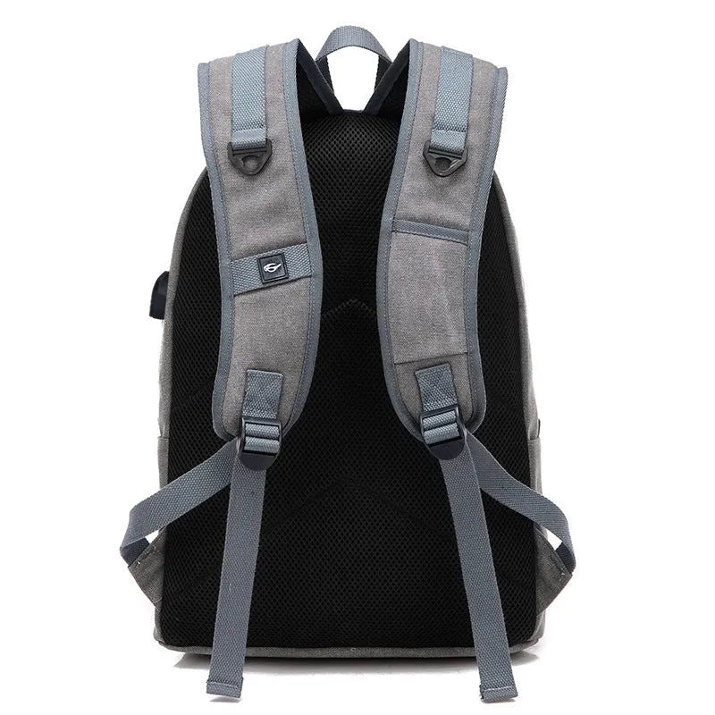 Canvas USB rechargeable backpack in khaki colour showing laptop pocket and shoulder straps