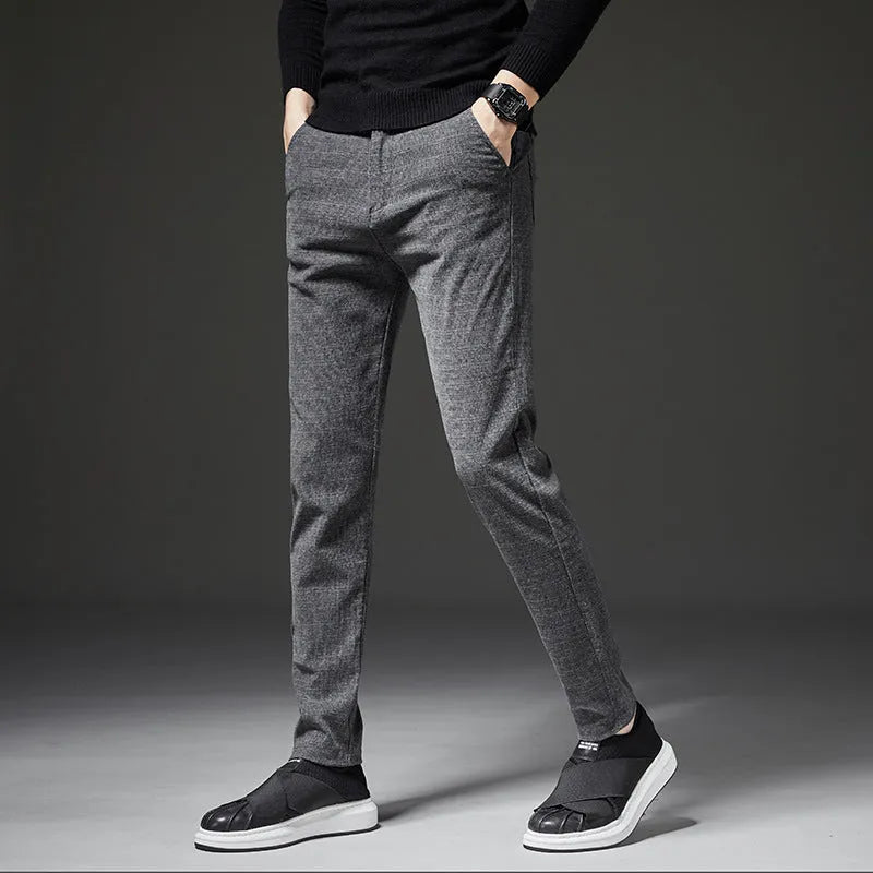 Men's casual slim fit polyester trousers in black, blue, and grey with waist sizes 28-38