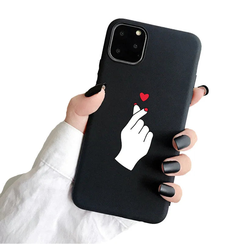 Frosted TPU iPhone case showing painted design options including graffiti, text, and a heart motif.