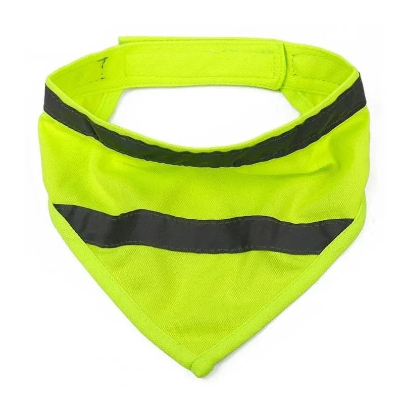 Yellow and orange reflective striped dog bandana scarf with adhesive strap closure on a dog's neck.