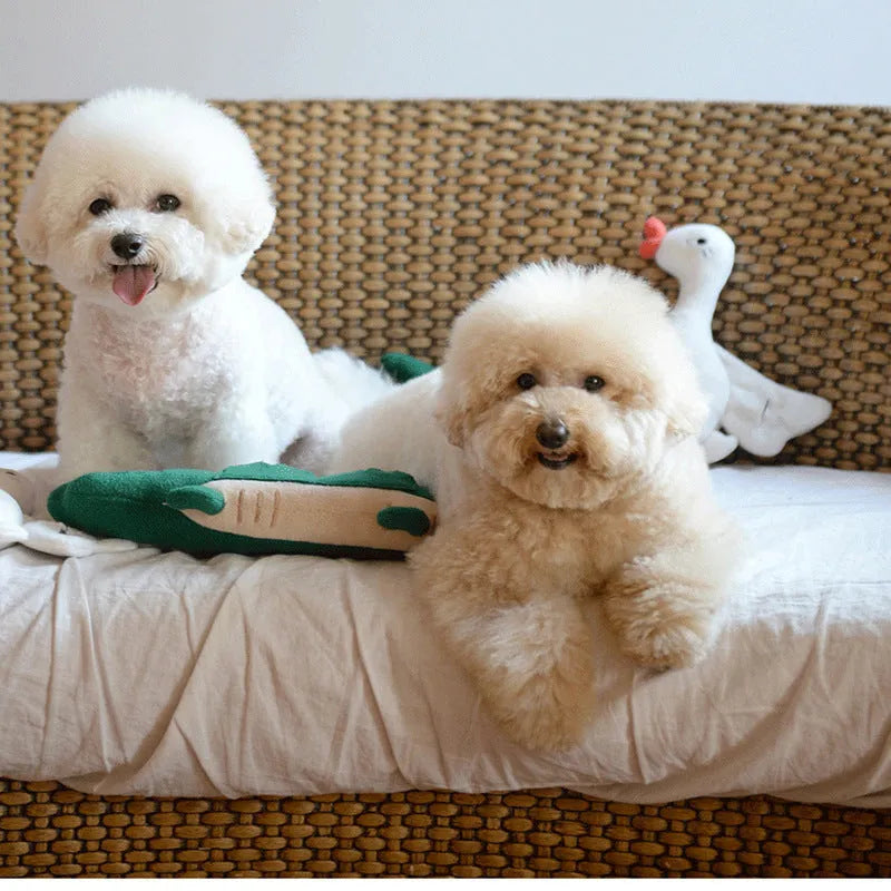 Green soft plush toy dog measuring 35 cm long on a white background