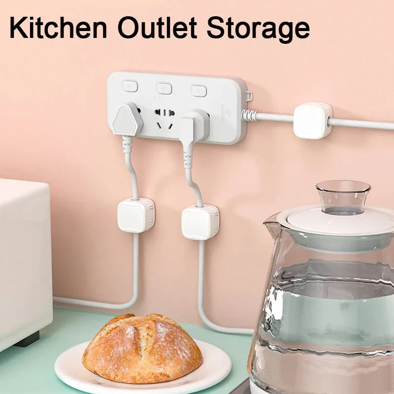 Black and white magnetic cable clips with adhesive backing for under desk cable management.