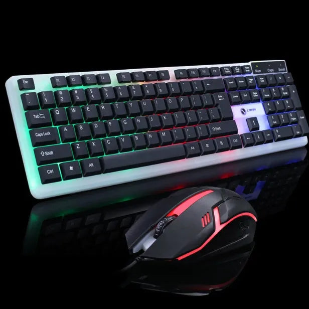 Wired gaming keyboard and mouse set with rainbow backlight and floating keys in black on a desk