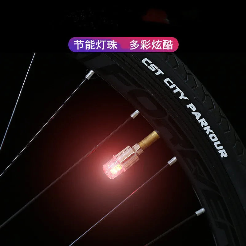 Colourful LED bicycle valve cap lights with battery packs and adapters for wheel valve stems