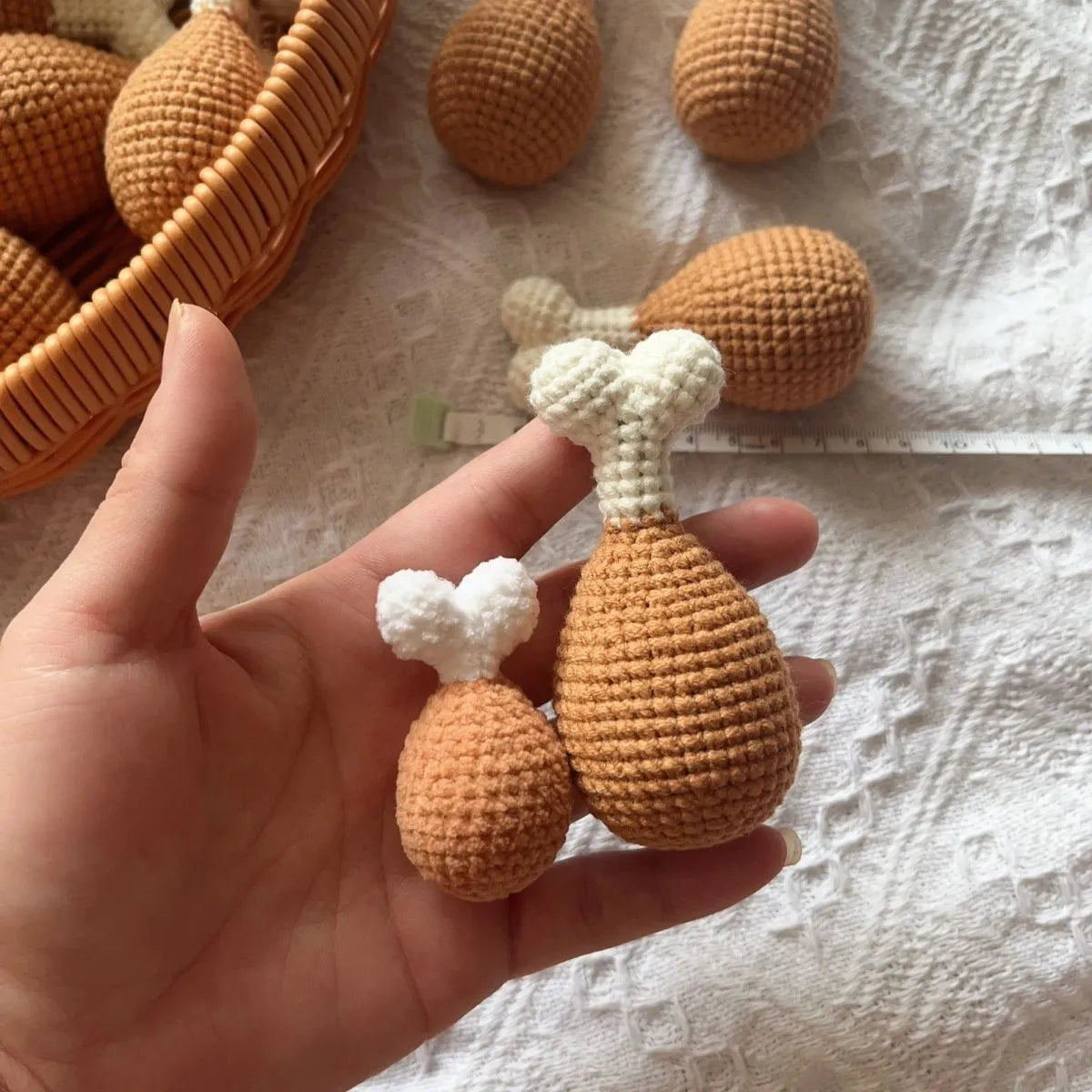 Crocheted plush chicken leg pendant key chain measuring 8cm in length.