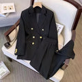 Women's loose fit polyester blouse in black, shown front-on, featuring regular sleeves and a slimming silhouette.