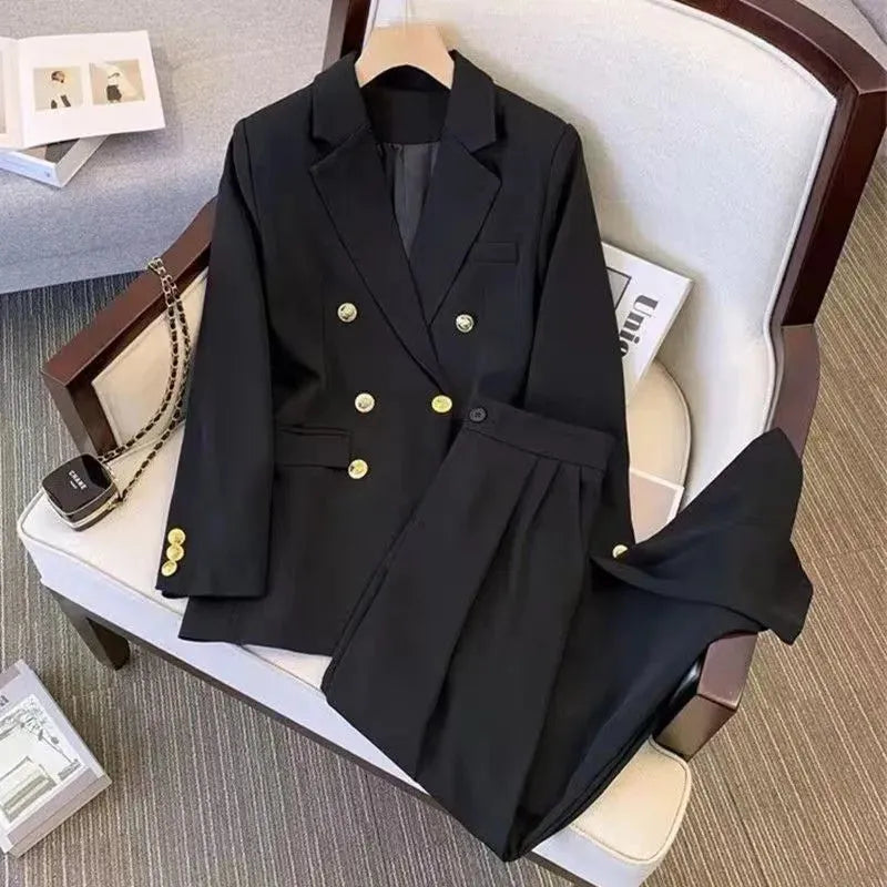 Women's loose fit polyester blouse in black, shown front-on, featuring regular sleeves and a slimming silhouette.
