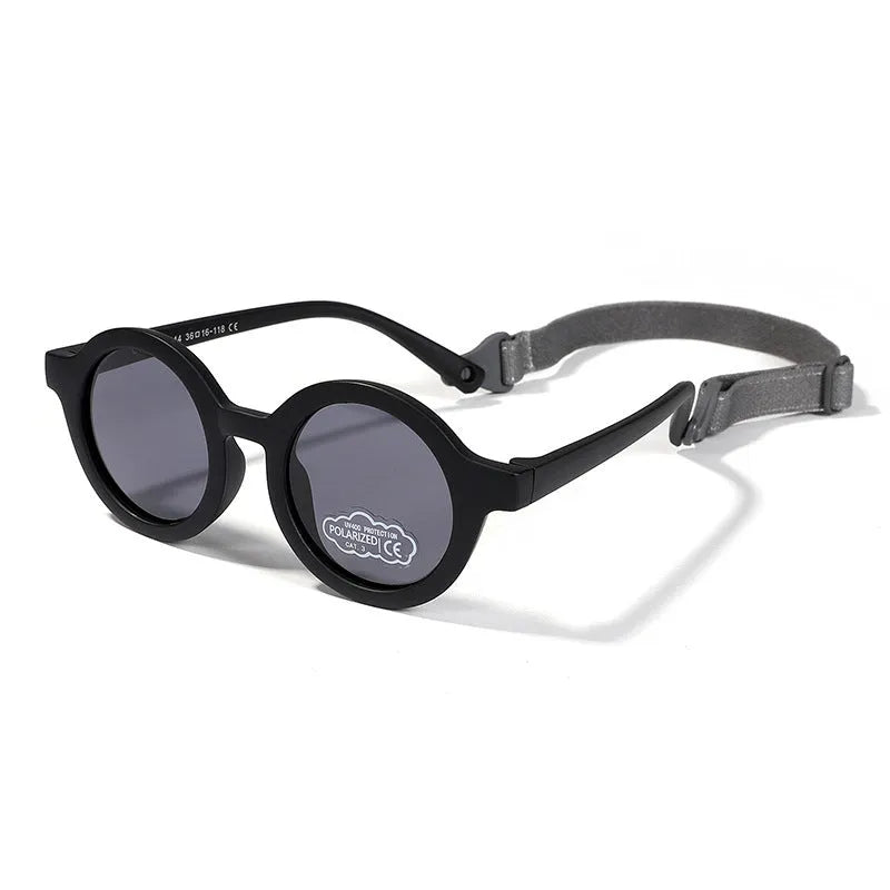 Children's silicone sunglasses for 0-3 year olds with round frame and polarized lenses in multiple colour options