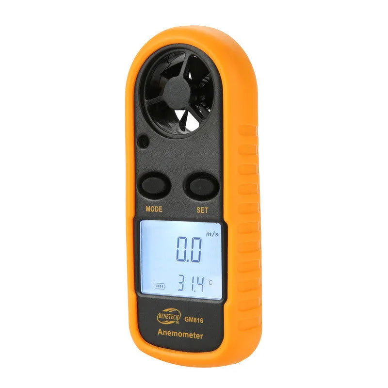 Orange digital portable anemometer wind speed measuring instrument showing compact size.