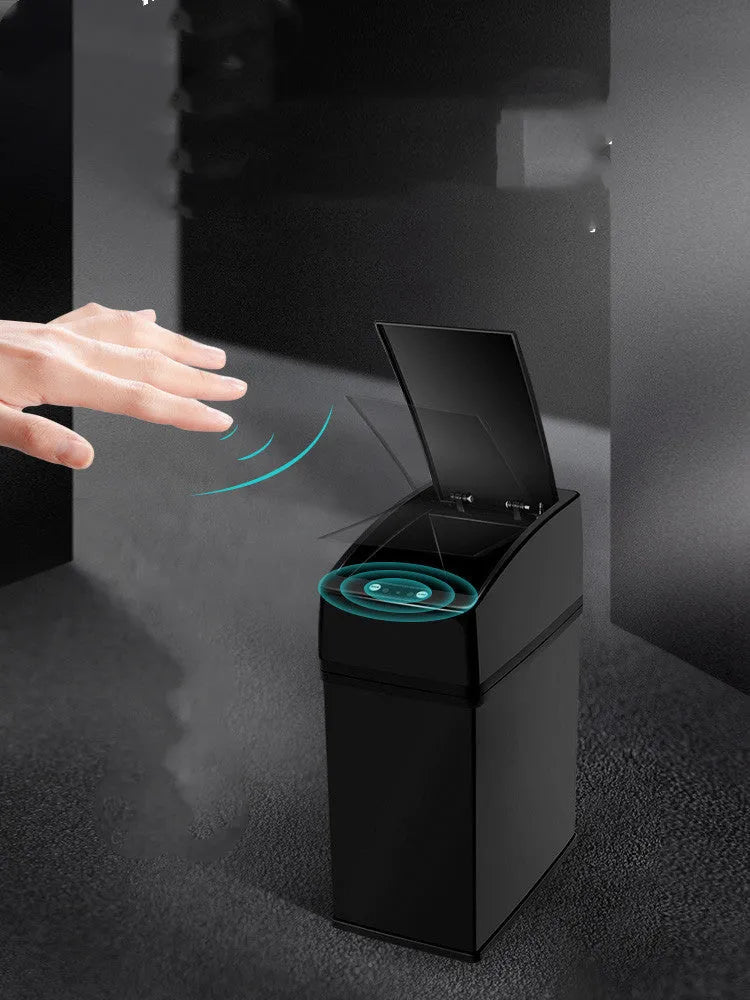 Black intelligent induction trash can with 3-litre capacity for car use on a car floor mat