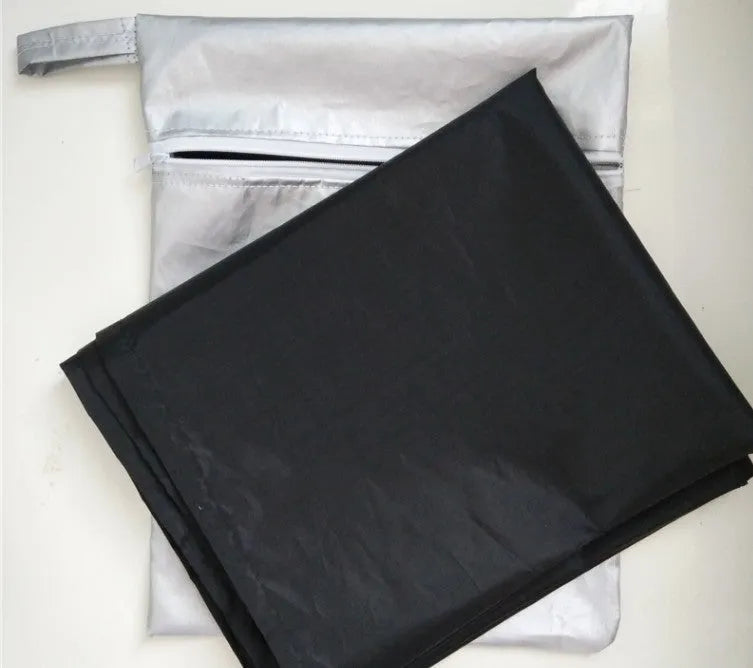 Magnetic car snow shield in black, 215x150x125cm size, on windshield for snow and frost protection