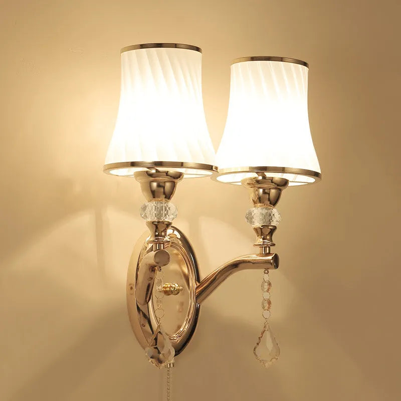 European style wall lamp with glass lampshade, available in single or double head configurations for bedroom or sitting room