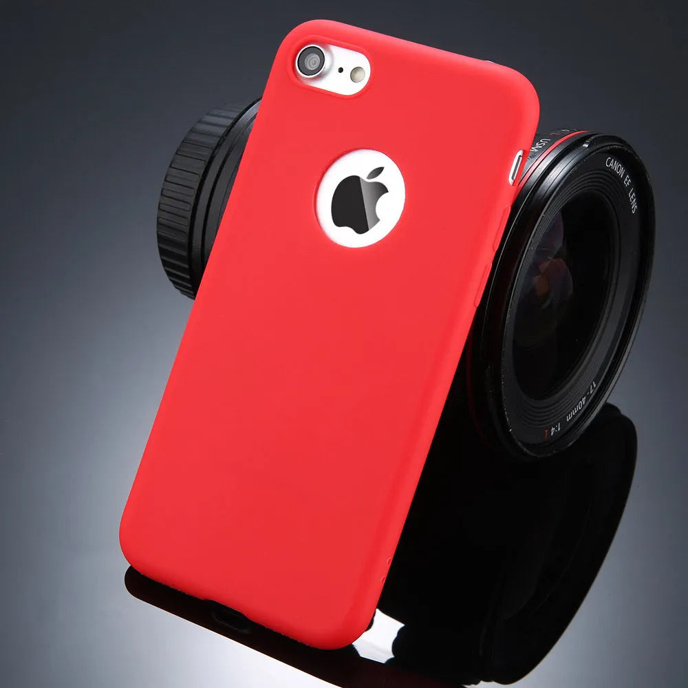 USLION soft silicon candy colour phone case for iPhone X XR 7 6 5 models on a table.