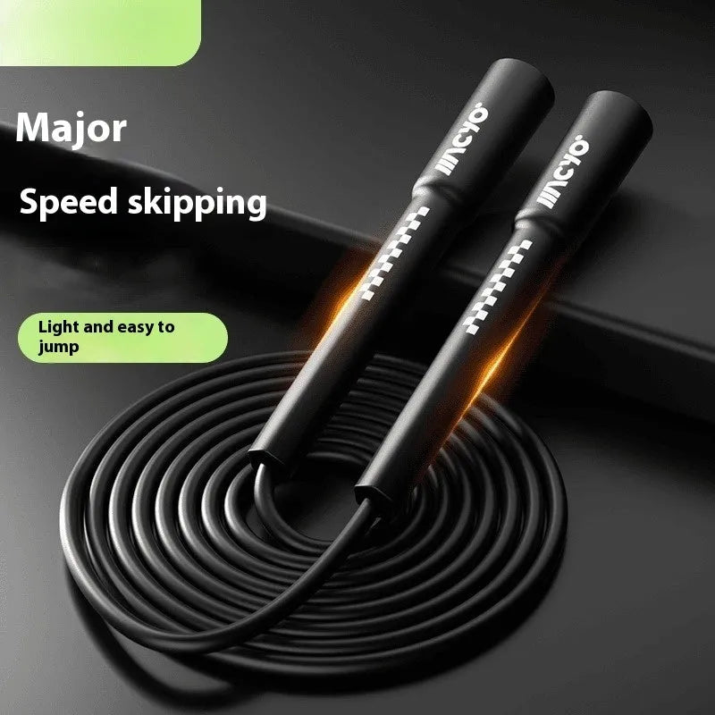 Fitness special skipping rope made of PVC in vibrant orange for physical exercise and cardio training